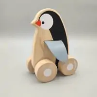 Pinguin en bois à roulettes Plan Toy